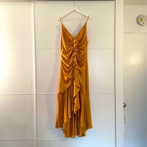 Size 12 Jonathan Simkhai front ruffle dress. Gently used. Gold color